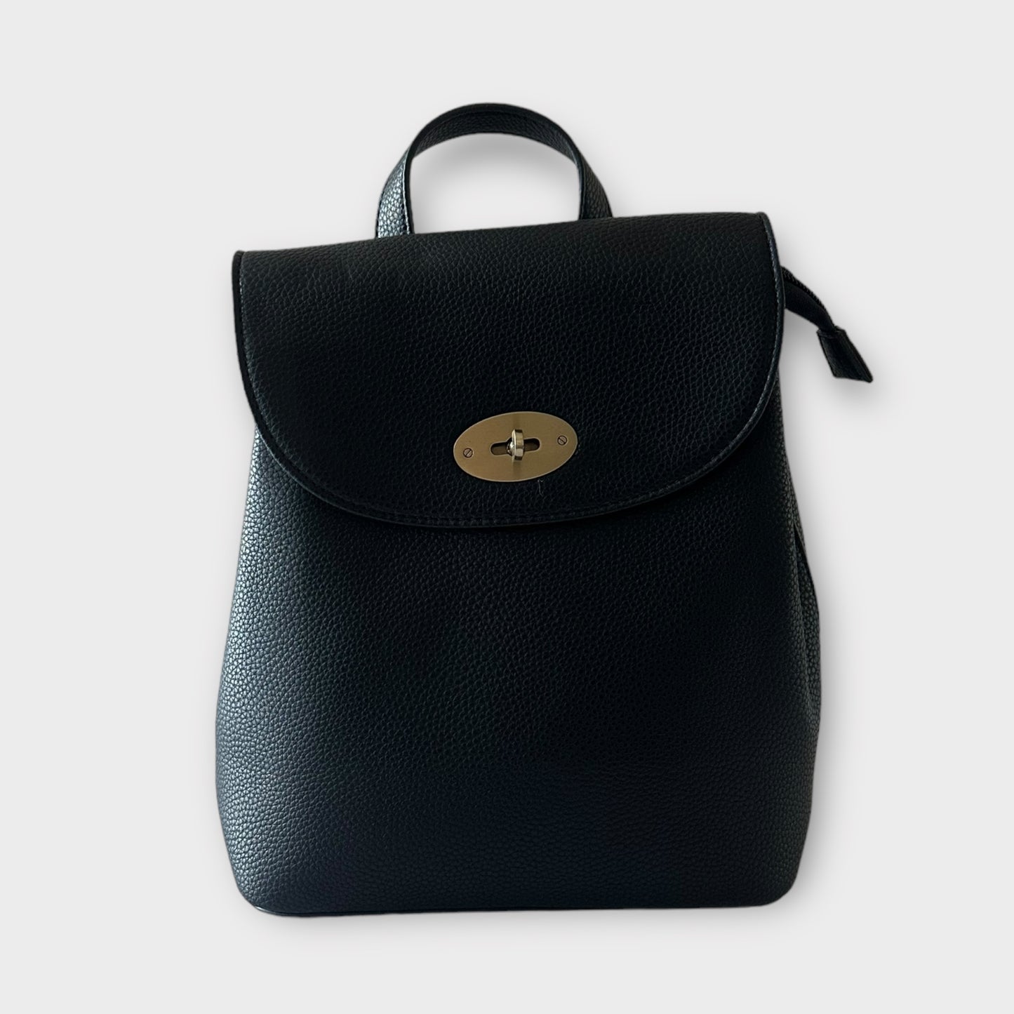 Lacie - Fold Over Twist Lock Backpack