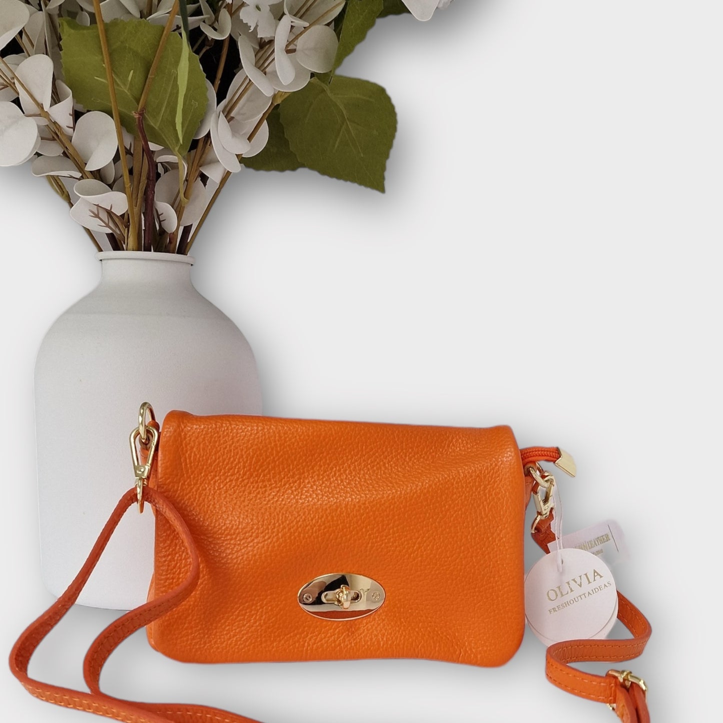 Olivia Leather Handbag, Flap over with postman lock detail